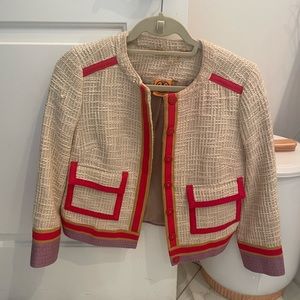 Beige Tory Burch tweed jacket. Trimmed in red, lavender and gold. Size 2.